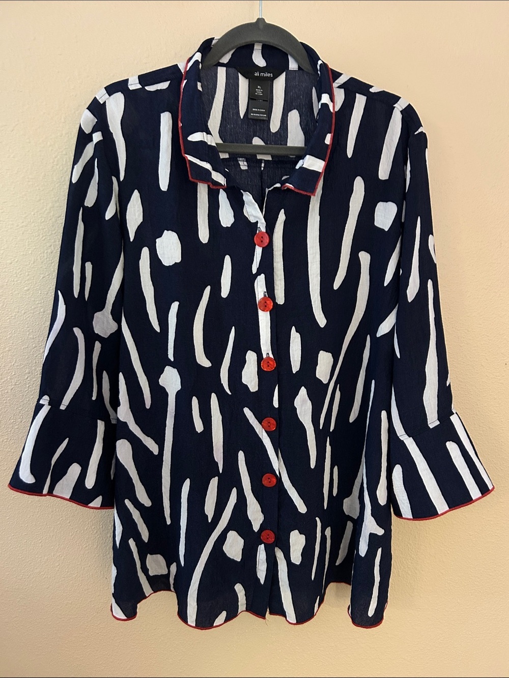 All Miles Wearable Art.  Navy & White Abstract Button-Up Blouse with Red Trim.